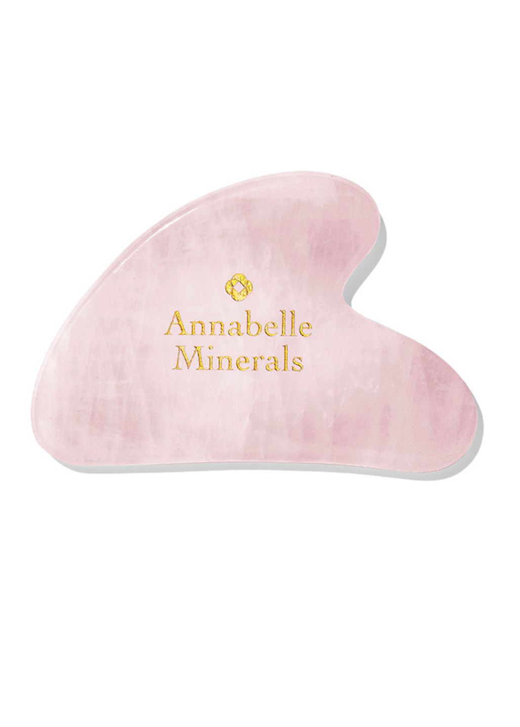 Płytka gua sha z różowego kwarcu Annabelle Minerals do masażu twarzy na jasnym tle